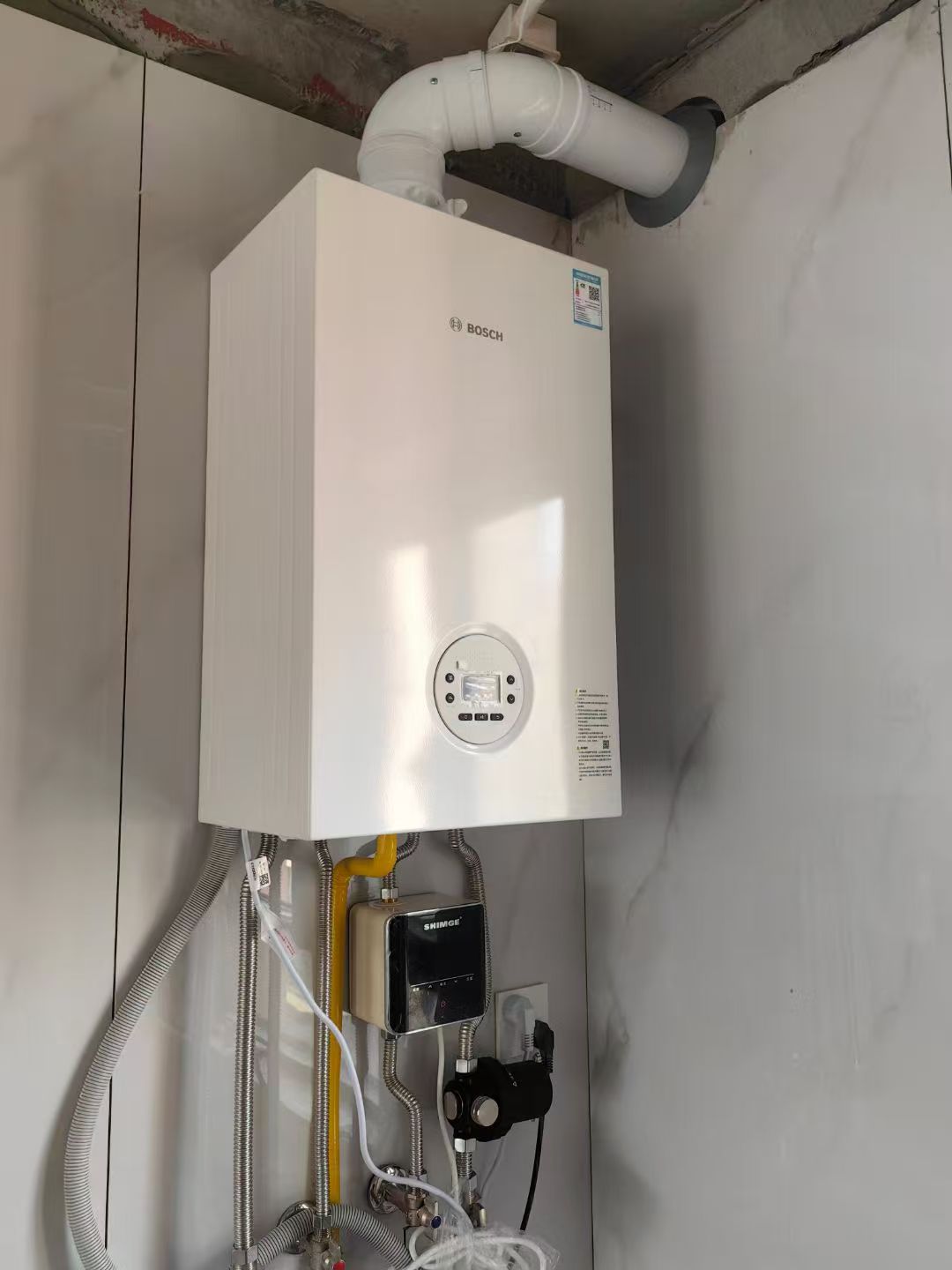 西城百万庄大街2号院博世3260-25KW壁挂炉安装案例